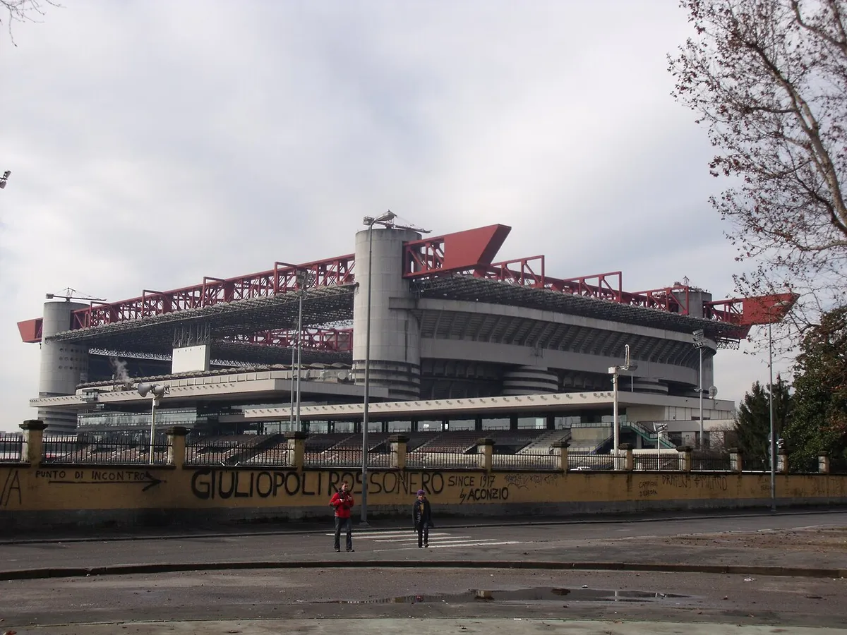 Wide daytime view of the San Siro exterior on a Milan stadium tour